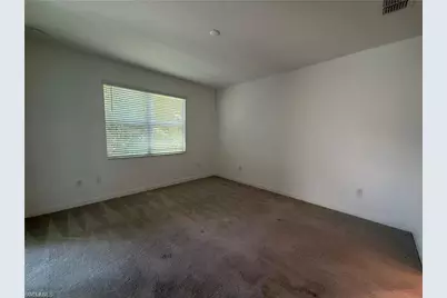 9077 Leatherwood Loop, Lehigh Acres, FL 33936 - Photo 16