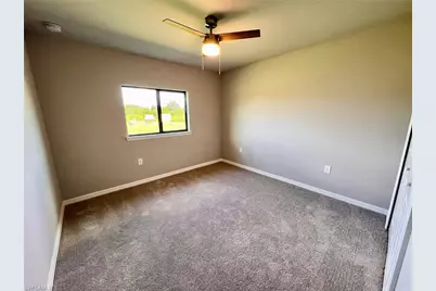 2706 56th St W, Lehigh Acres, FL 33971 - Photo 4