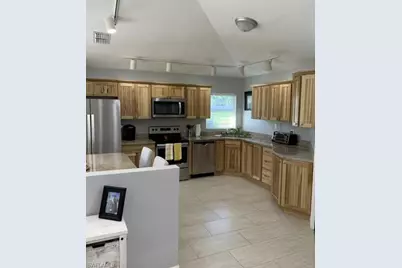 21174 Butchers Holler, Estero, FL 33928 - Photo 2