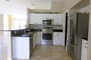 1303 SW 34th St, Cape Coral, FL 33914 - Photo 6