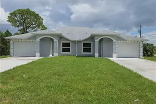 399 Carrillon Ave S, Lehigh Acres, FL 33974 - Photo 2