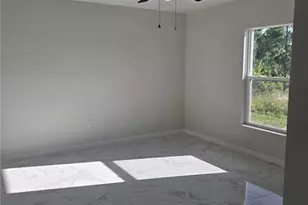 399 Carrillon Ave S, Lehigh Acres, FL 33974 - Photo 8