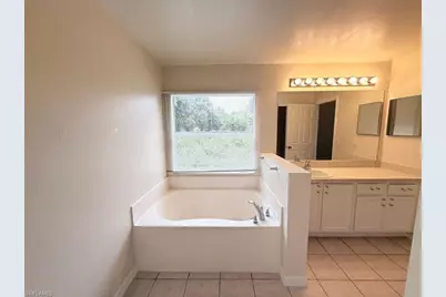 706 Oro Ave S, Lehigh Acres, FL 33974 - Photo 12