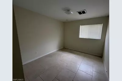 573 Bourse Cir, Lehigh Acres, FL 33974 - Photo 8