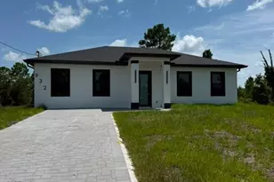 932 Dempsey St, Lehigh Acres, FL 33974 - Photo 2