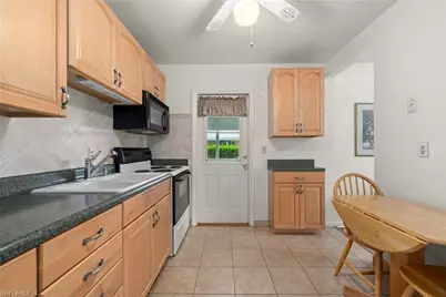 16 Dawn Flower Cir, Lehigh Acres, FL 33936 - Photo 6