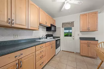16 Dawn Flower Cir, Lehigh Acres, FL 33936 - Photo 10
