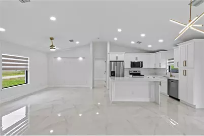 927 NE 32nd Ter, Cape Coral, FL 33909 - Photo 26