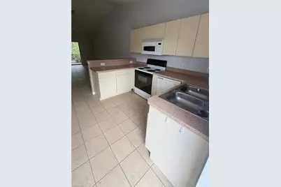 1002 W 12th St, Lehigh Acres, FL 33972 - Photo 2
