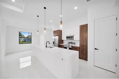 1143 NW 27th Pl, Cape Coral, FL 33993 - Photo 6