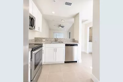 1631 SW 1st Ave #106, Cape Coral, FL 33991 - Photo 4