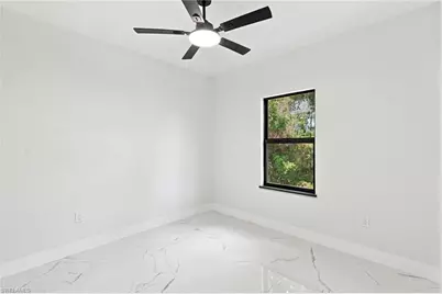 2818 13th St SW, Lehigh Acres, FL 33976 - Photo 6