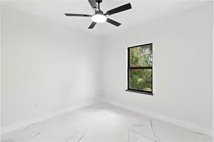 2818 13th St SW, Lehigh Acres, FL 33976 - Photo 6
