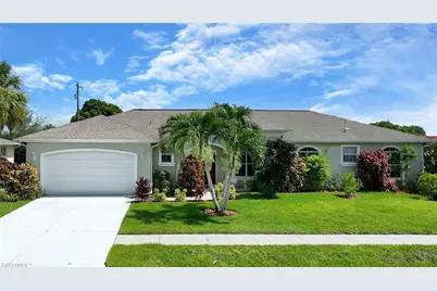 599 Genevieve Dr, Lehigh Acres, FL 33936 - Photo 1