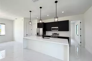 3108 23rd St SW, Lehigh Acres, FL 33976 - Photo 6