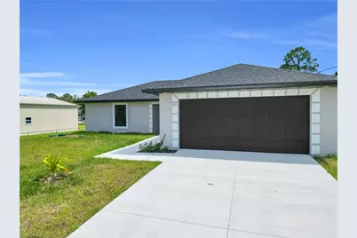 823 McKinley Ave, Lehigh Acres, FL 33972 - Photo 1