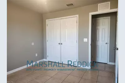202 Homer Ave S, Lehigh Acres, FL 33973 - Photo 12