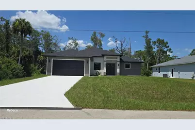 580 Woodview Dr, Lehigh Acres, FL 33972 - Photo 1