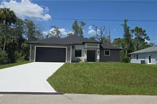 580 Woodview Dr, Lehigh Acres, FL 33972 - Photo 1
