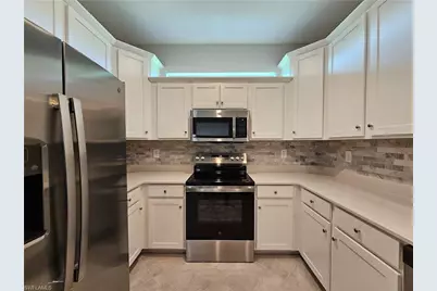 20501 Hazelnut Ct S, Lehigh Acres, FL 33936 - Photo 6