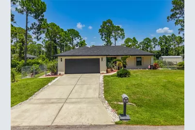 927 Franklin St E, Lehigh Acres, FL 33974 - Photo 1