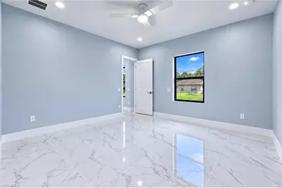 1054 Barnett St E, Lehigh Acres, FL 33974 - Photo 10