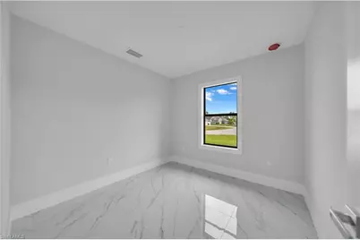 457 Woodman Dr, Lehigh Acres, FL 33972 - Photo 24
