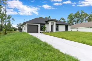 457 Woodman Dr, Lehigh Acres, FL 33972 - Photo 2