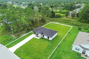 457 Woodman Dr, Lehigh Acres, FL 33972 - Photo 36