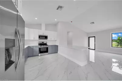 457 Woodman Dr, Lehigh Acres, FL 33972 - Photo 12