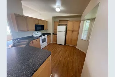 445 Candlewick Cir W, Lehigh Acres, FL 33936 - Photo 2