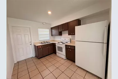 711 Gordon Ave S, Lehigh Acres, FL 33973 - Photo 4
