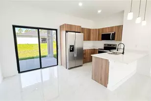 723 Bering Ave S, Lehigh Acres, FL 33974 - Photo 8