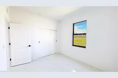 723 Bering Ave S, Lehigh Acres, FL 33974 - Photo 14