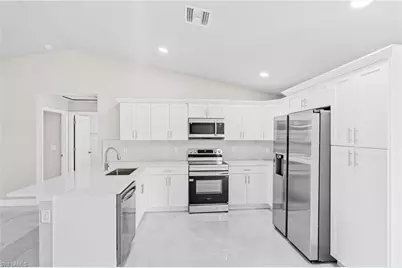 313 Laurel Ave, Lehigh Acres, FL 33974 - Photo 6