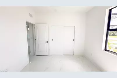 721 Bering Ave S, Lehigh Acres, FL 33974 - Photo 14