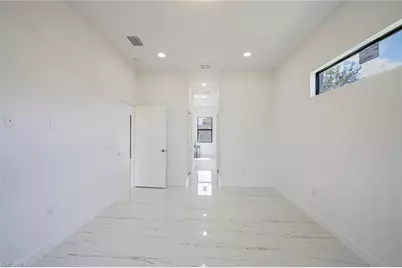 2604 73rd St W, Lehigh Acres, FL 33971 - Photo 12
