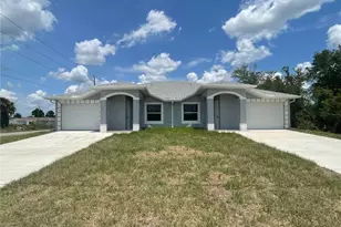 874/876 Duplex St E, Lehigh Acres, FL 33974 - Photo 1