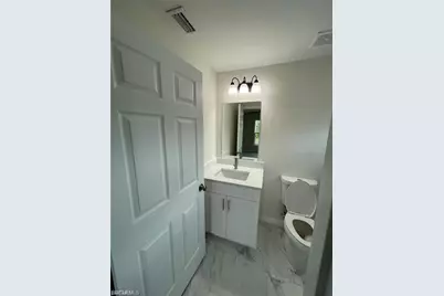 874/876 Duplex St E, Lehigh Acres, FL 33974 - Photo 18