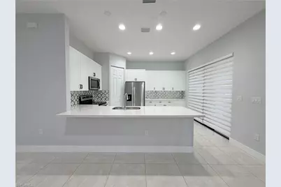 9045 Madrid Cir, Naples, FL 34104 - Photo 2