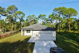 1030 Greenfield St, Lehigh Acres, FL 33974 - Photo 1