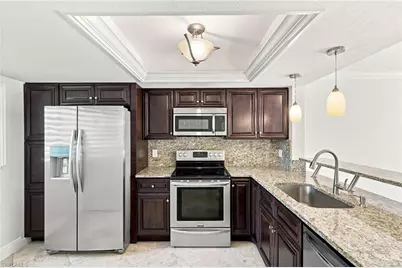136 Cypress Way E #4, Naples, FL 34110 - Photo 2