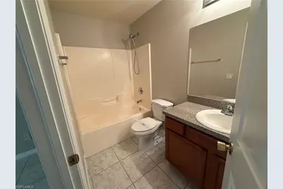 1040 Ainsworth St E, Lehigh Acres, FL 33974 - Photo 10