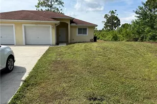 1040 Ainsworth St E, Lehigh Acres, FL 33974 - Photo 1