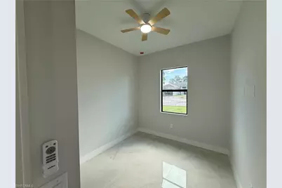 824 Dawhert Ave S, Lehigh Acres, FL 33974 - Photo 48