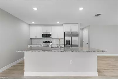 337 Woodburn Dr, Lehigh Acres, FL 33972 - Photo 10