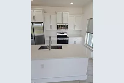 4425 SW Santa Barbara Pl #203, Cape Coral, FL 33914 - Photo 4
