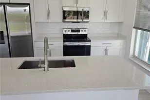 4425 SW Santa Barbara Pl, Cape Coral, FL 33914 - Photo 4