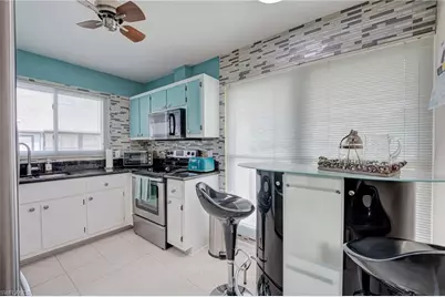 10501 Arlingford Blvd, Lehigh Acres, FL 33936 - Photo 6