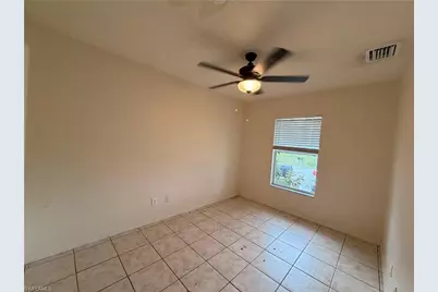 2438 George Ave S, Lehigh Acres, FL 33973 - Photo 6